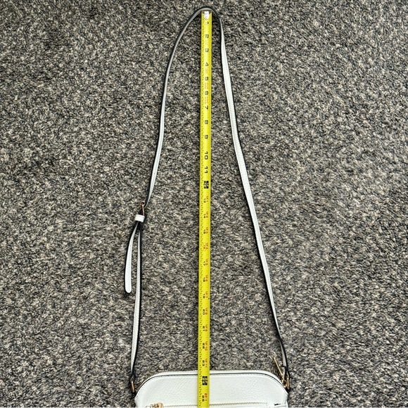 White Chevron Quilted Medium Crossbody Bag with Tassel Accent - Picture 11 of 11